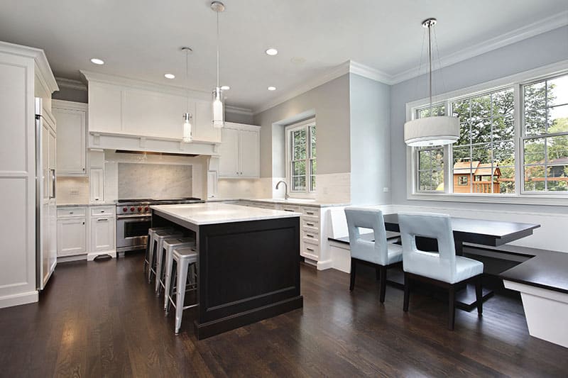 Black And White Kitchen Island Blends With Cabinets Bright Ceiling And Floor