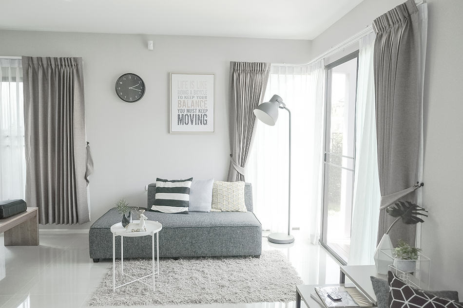 Living Room With Light Grey Walls And Curtains