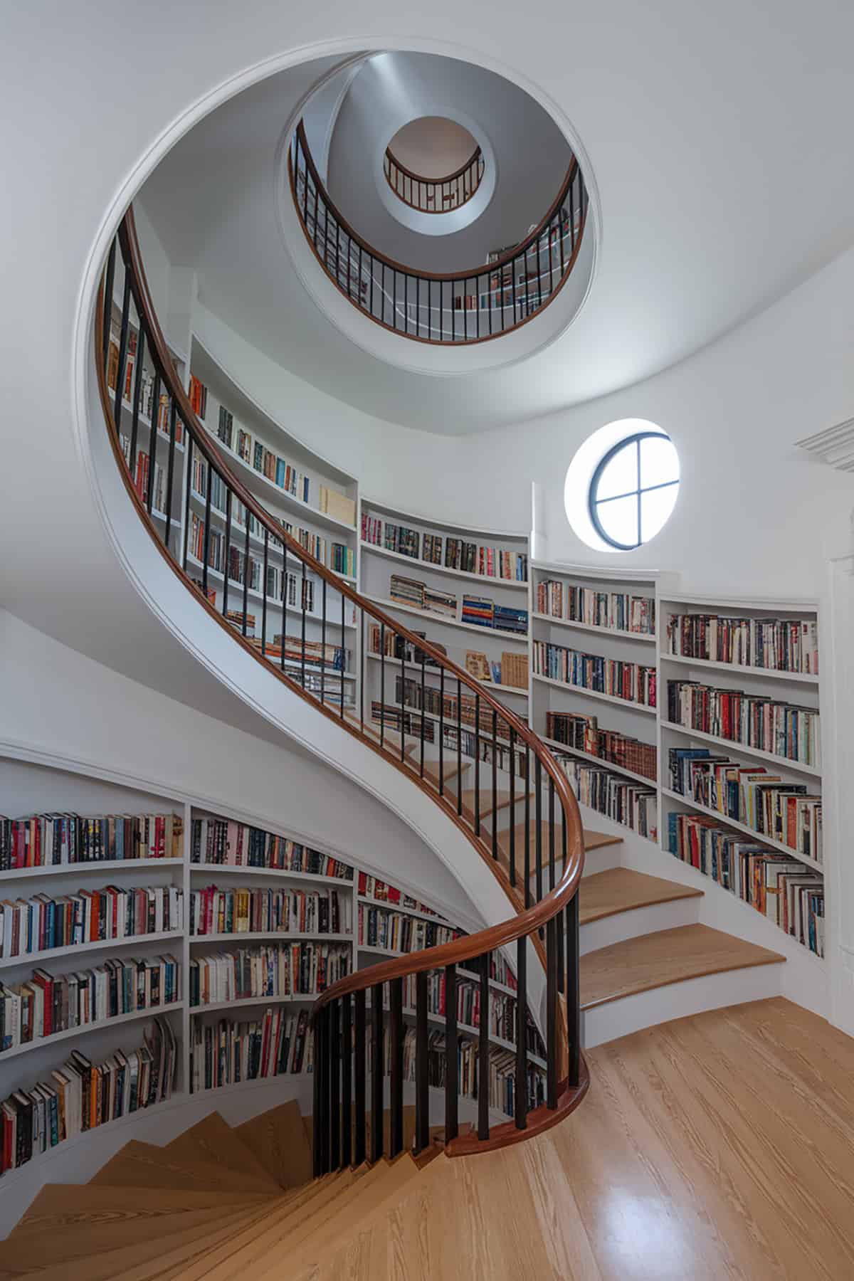 Bookshelves Around A Spiral Staircase