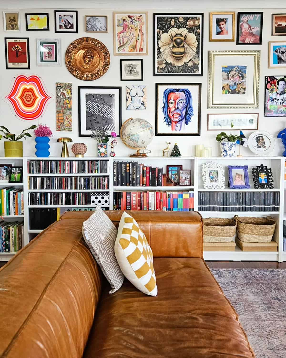 Maximalist Living Room Photo Wall with Mixed Media